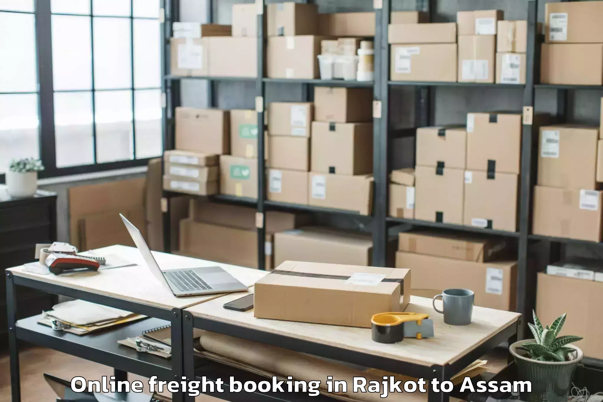 Affordable Rajkot to Raha Gaon Online Freight Booking